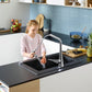 kid washing apple with hansgrohe pull out spray kitchen sink mixer